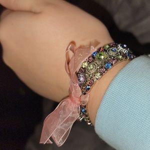 Multi-colored silver bracelet with bow